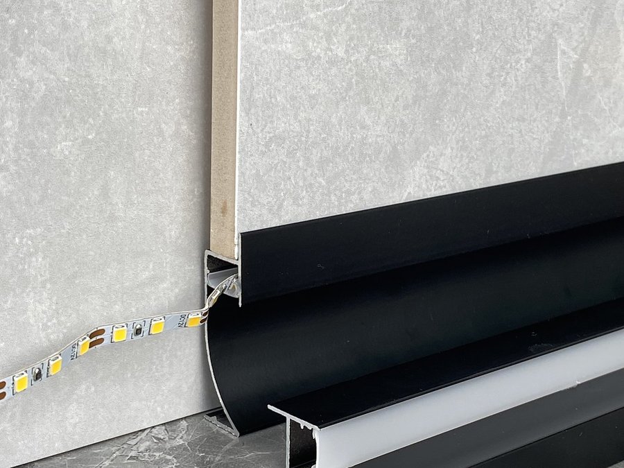 Feature wall: Light from the floor up a stone or panel wall.
