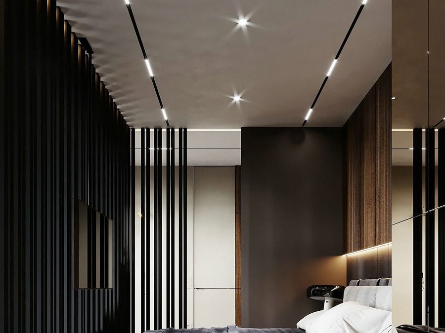 Bedroom: A trimless line over the bed, spots on the wardrobe wall.
