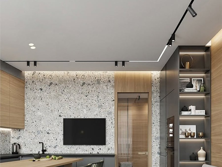 Kitchen / living: An L along the counter, spots at the island corner.