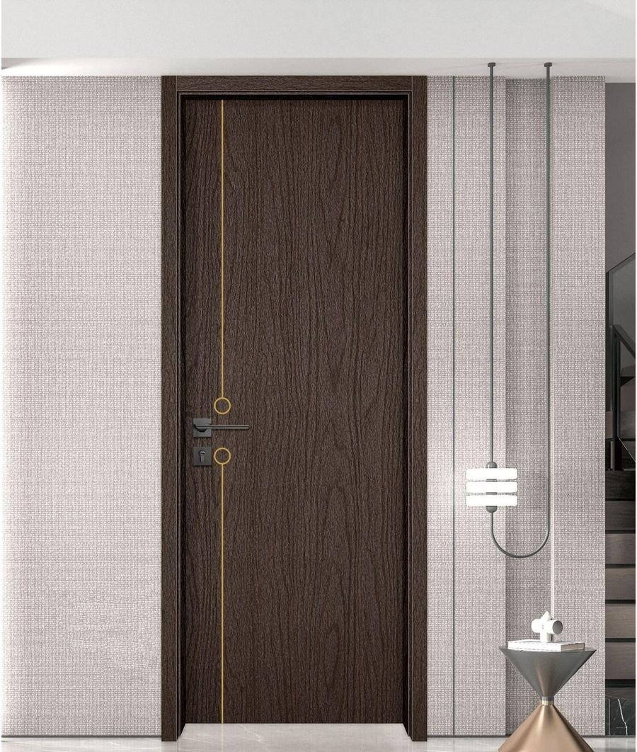 Avente Hub wood-grain aluminum baseboard beside a WPC door
